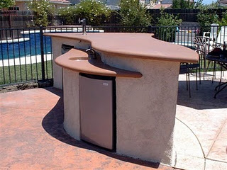 custom BBQ entertainment island with concrete countertop