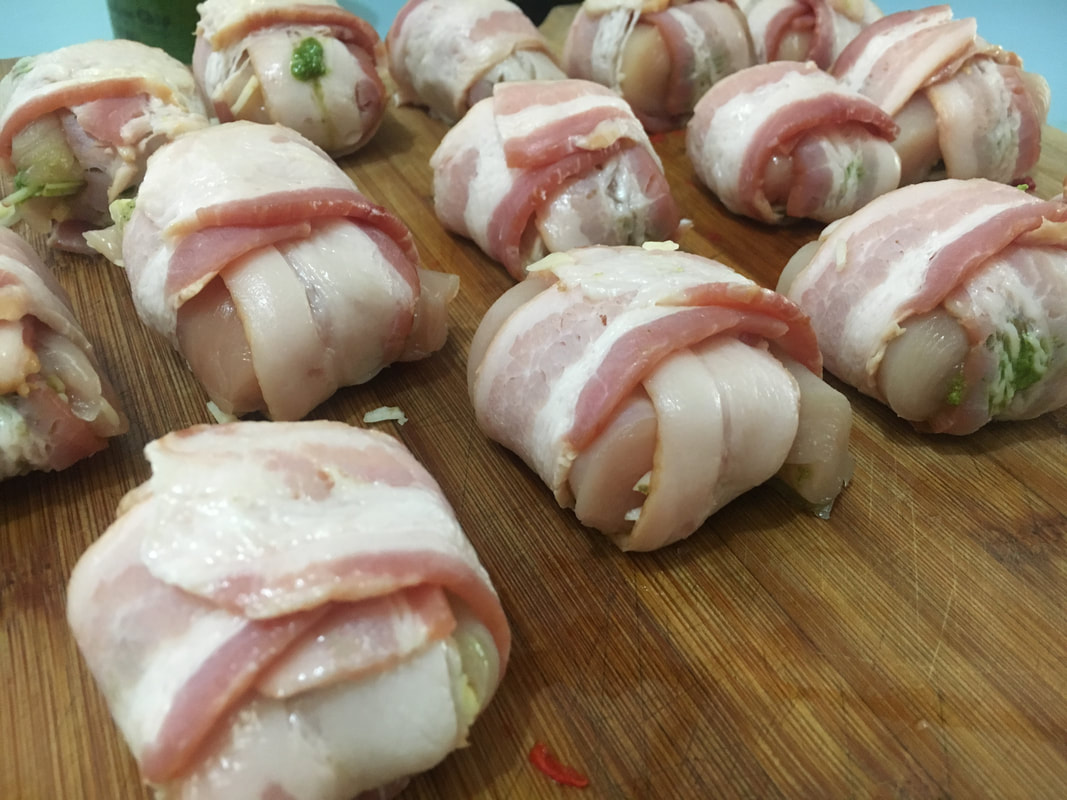 Bacon wrapped stuffed BBQ chicken bombs