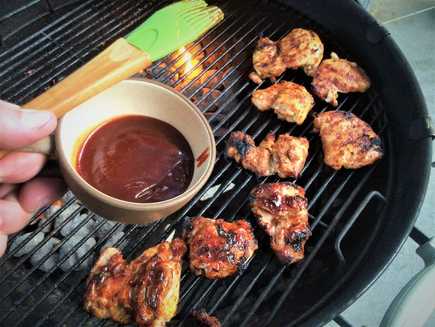 BBQ grilled chicken thighs with BBQ sauce