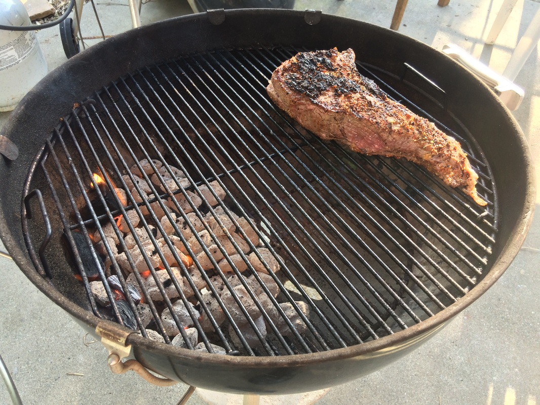 indirect grilling a BBQ tri tip roast on a weber kettle